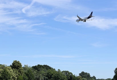 Chartering A Plane: Optimizing Air Travel While Reducing Carbon Footprint | Photo by Sebastian Herrmann on Unsplash